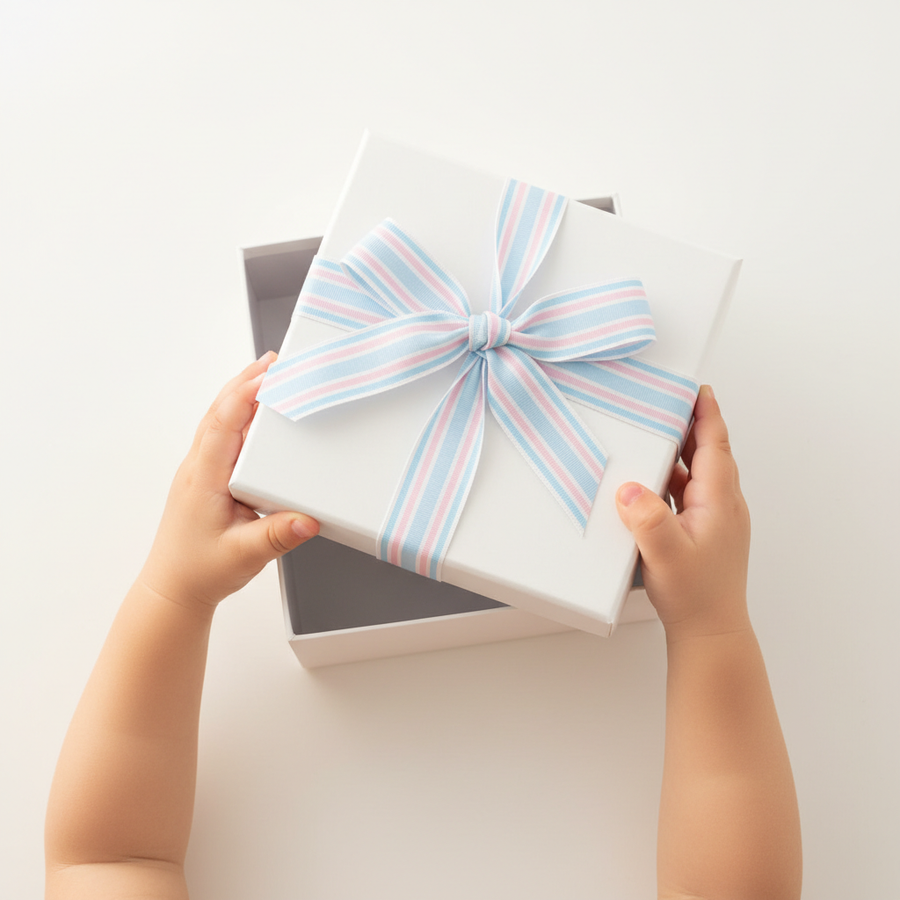 Child's hands opening a mystery gift box